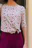 POLERA NUDO FLORES