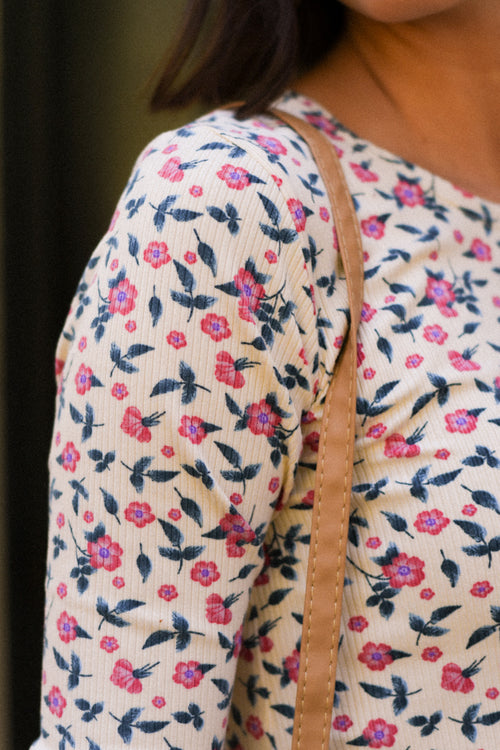 POLERA NUDO FLORES